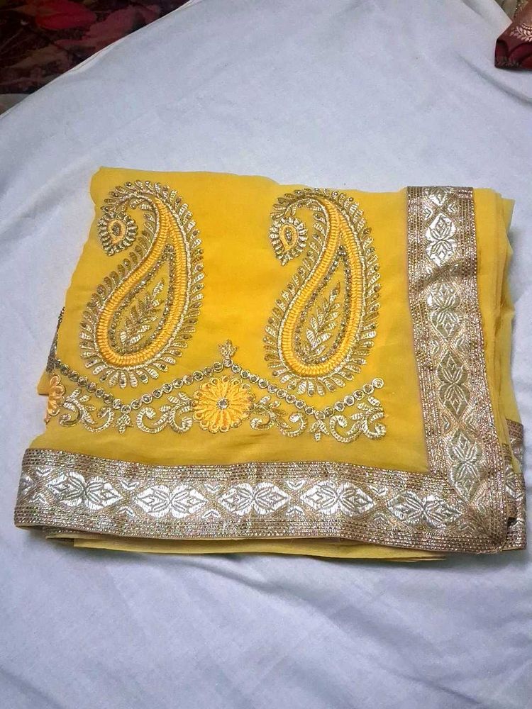 embroidery and stone work yellow color saree