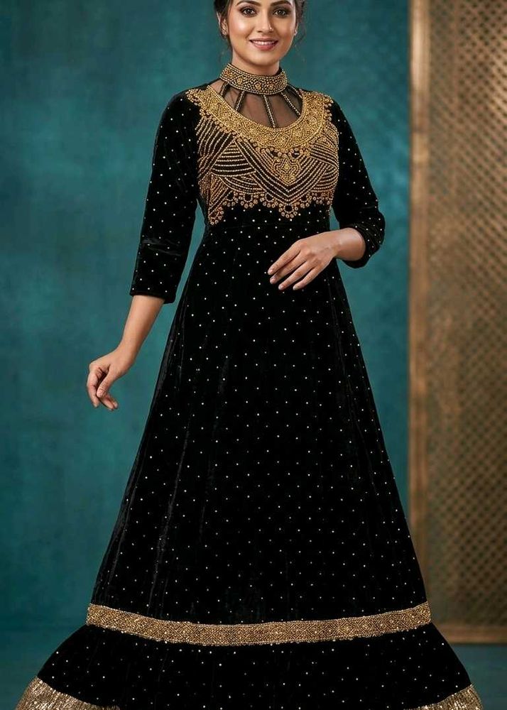 Elegant Black Velvet Gown with Gold Embellishments