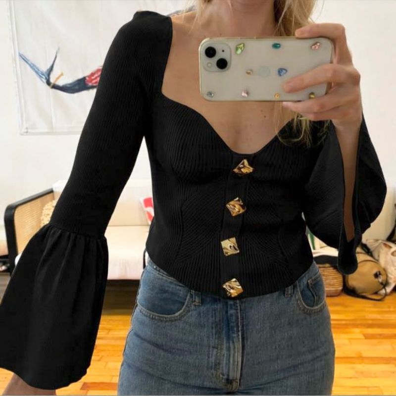 Chic Black Top with gold buttons