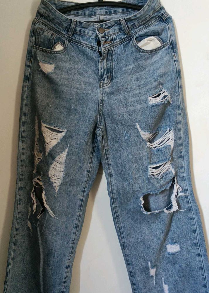 Distressed Blue Jeans