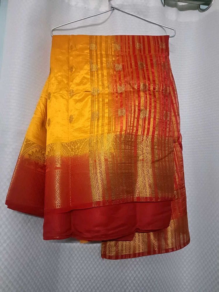 Yellow saree with red blouse
