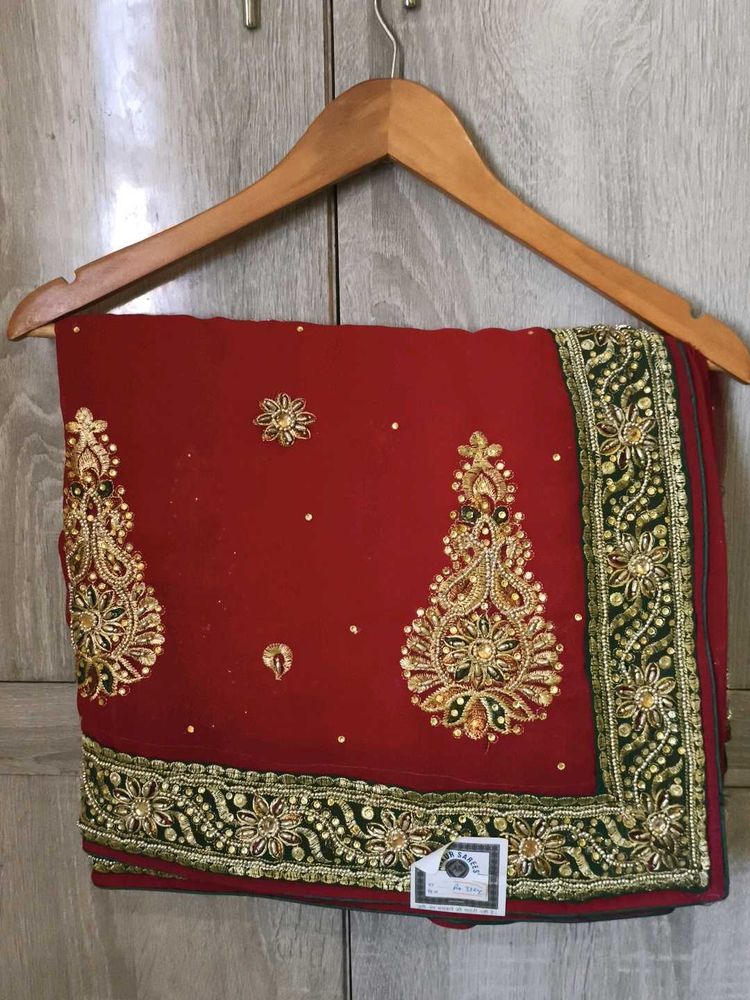 Embroidered Red Saree with Green Border