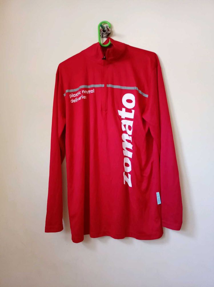 long-sleeved quarter-zip jersey for Zomato.