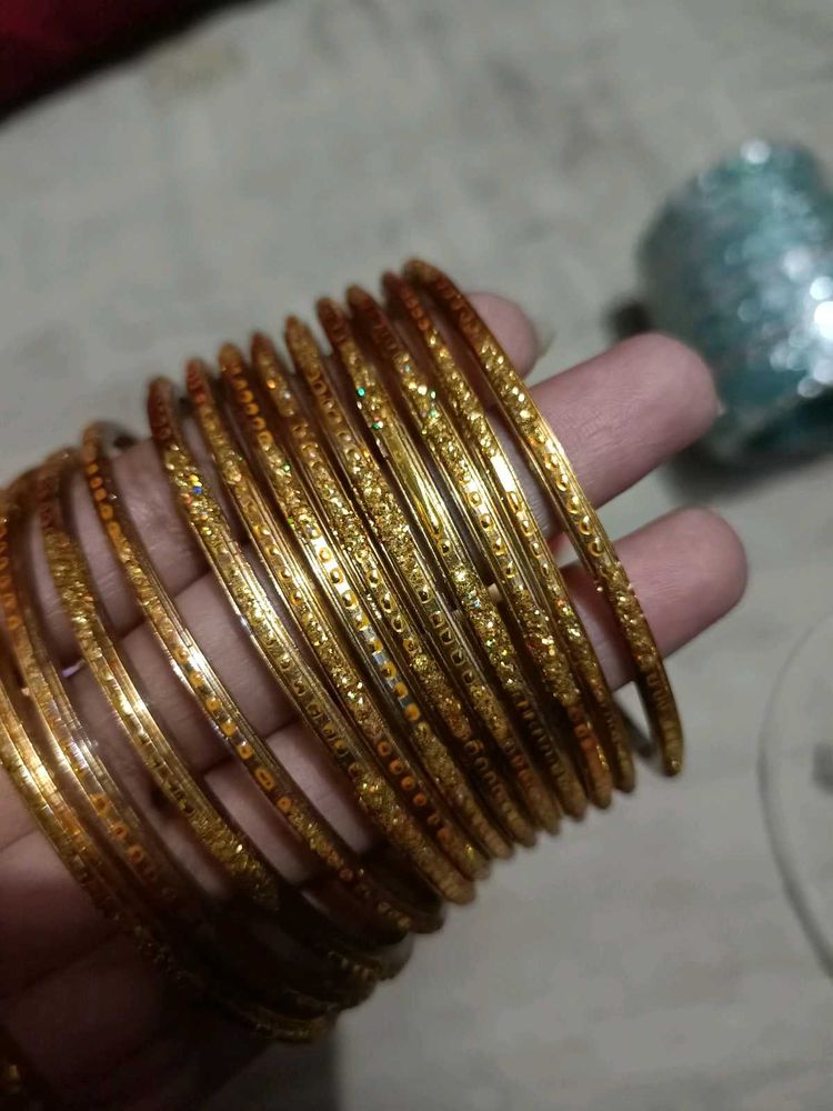 Elegant Gold Tone Bangle Set