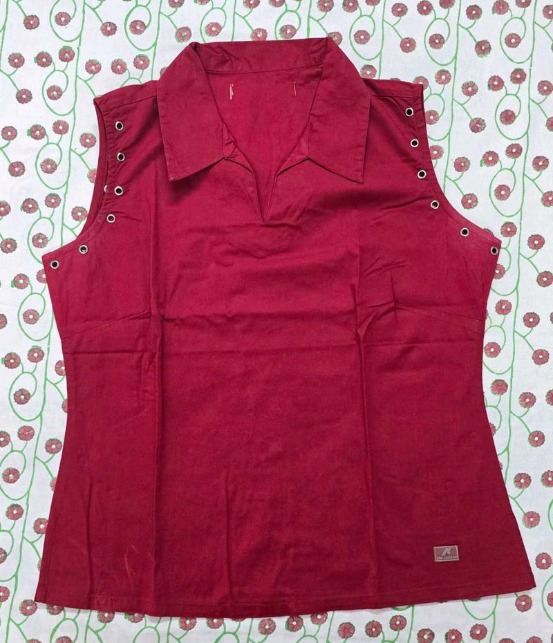 Embellished red sleeveless top