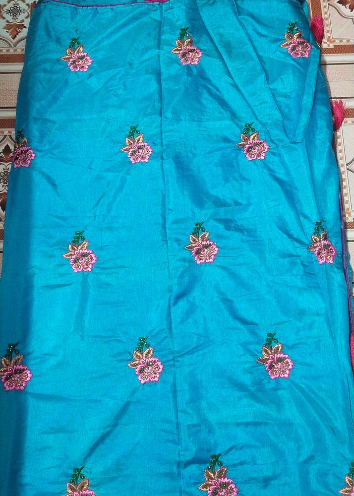 Embroidered Turquoise Fabric