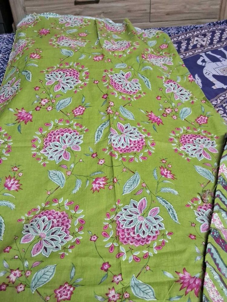Beautiful Green Floral Dress Material @ 100per mtr