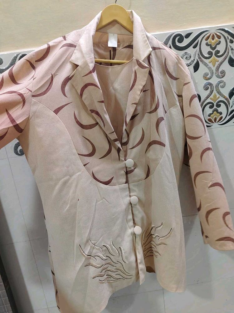 Stylish Beige Blazer with Unique Print