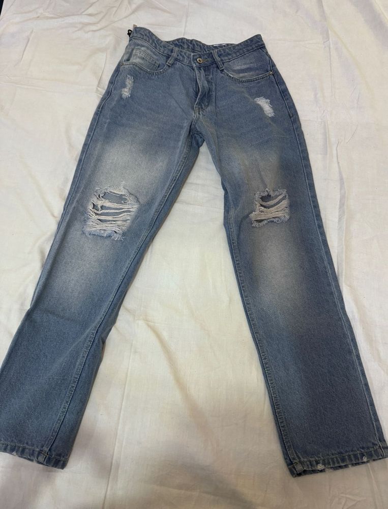 Distressed Blue Denim Jeans