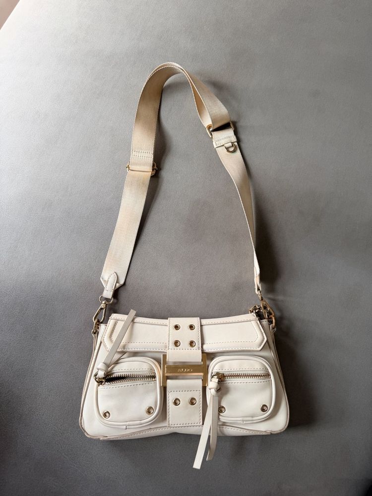 also Sling Bag