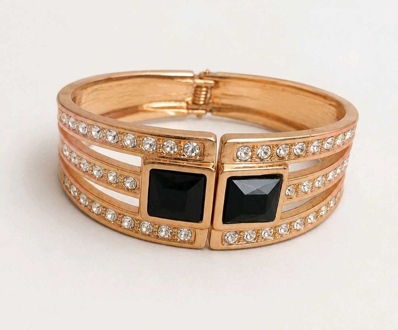 Elegant Rose Gold Bangle with Black Stones