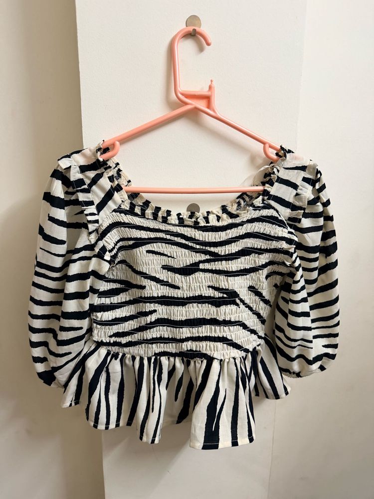 Zebra Print Peplum Top