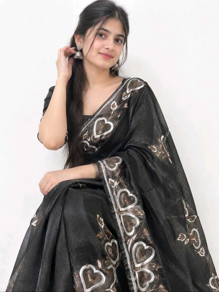 Elegant Black Saree with Heart Motifs