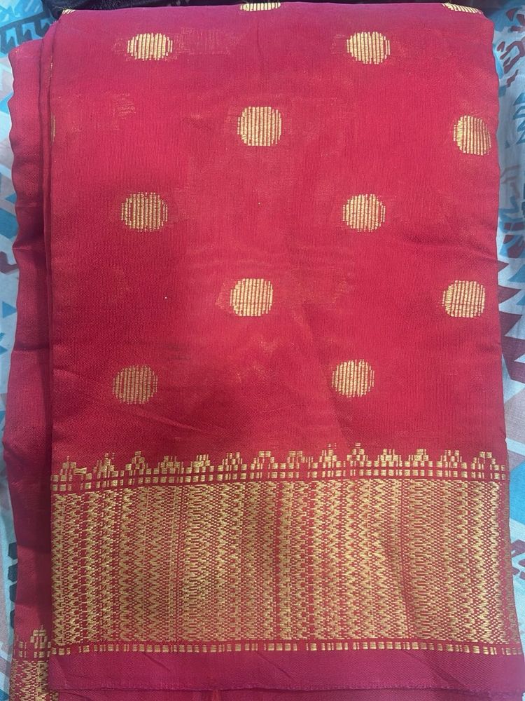 Elegant Red Saree with Gold Polka Dots