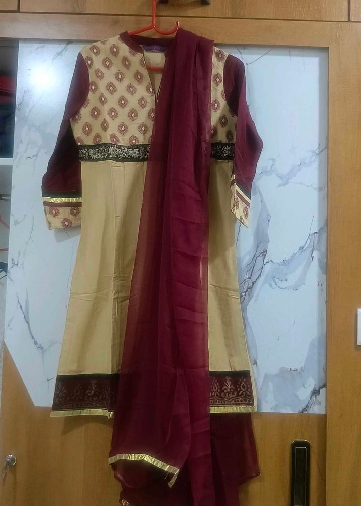 Beige and Maroon Kurta churidar with Dupatta