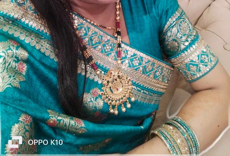 Beautiful Teal Saree with Intricate Weaving