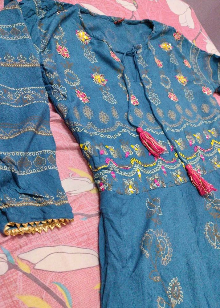 ethenic flayered gown