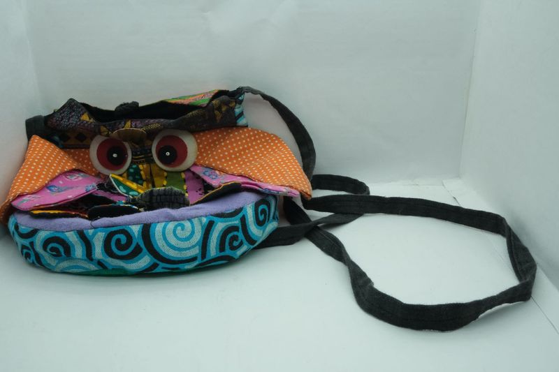 Colourful owl sling bag
