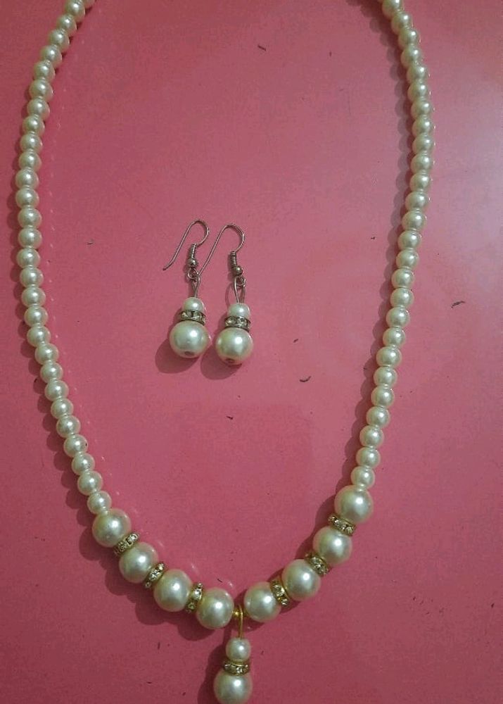 neck piece with earing