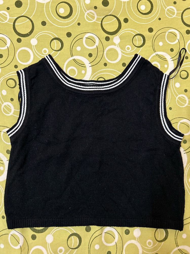 Sleeveless Black Top with Striped Neckline