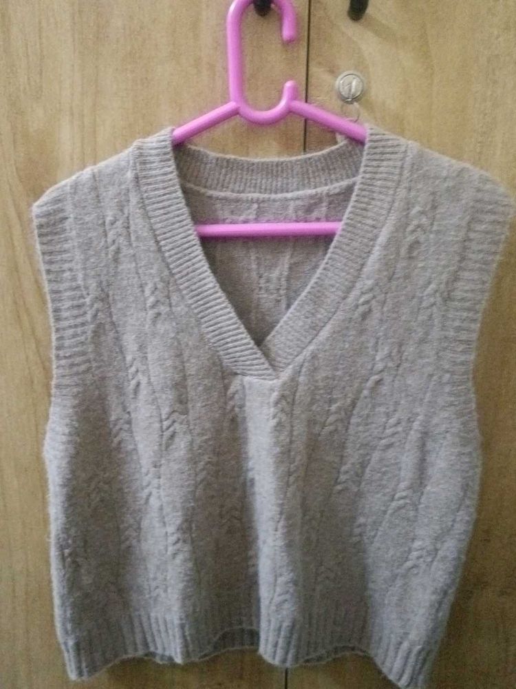 Knitted beige vest