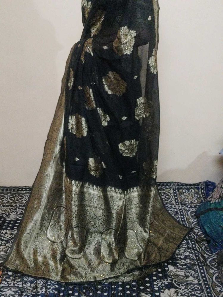 Elegant Black Saree with Gold Border