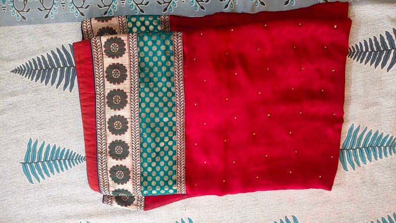 red designer saree with big border