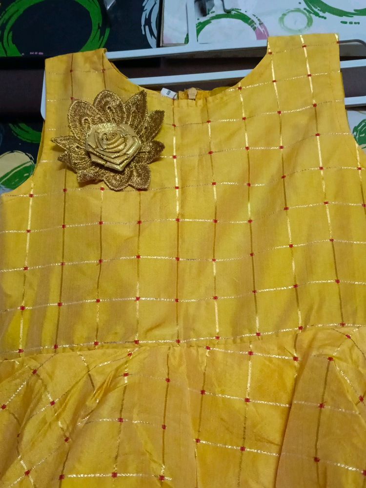 Vibrant Yellow Dress with Golden Flower