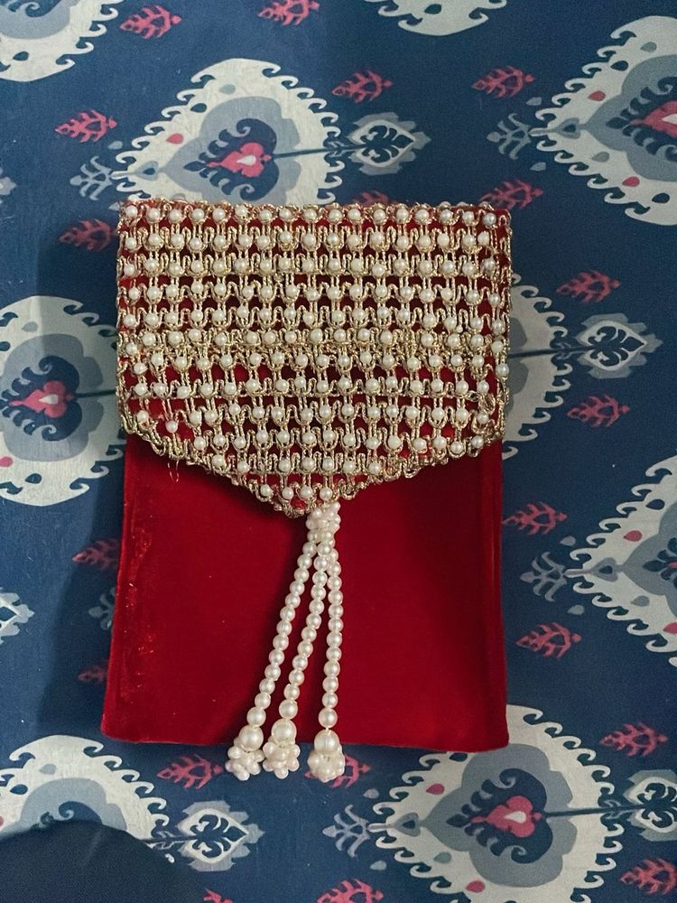 Embellished Clutch with Pearl Tassels