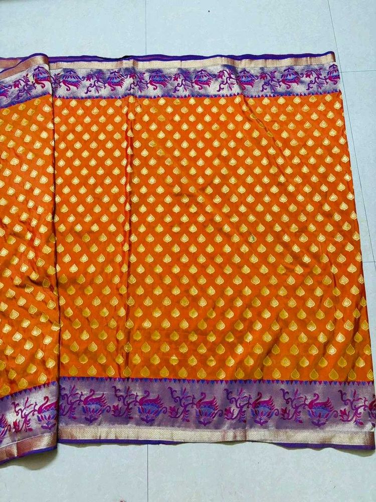 Exquisite Orange Brocade Saree