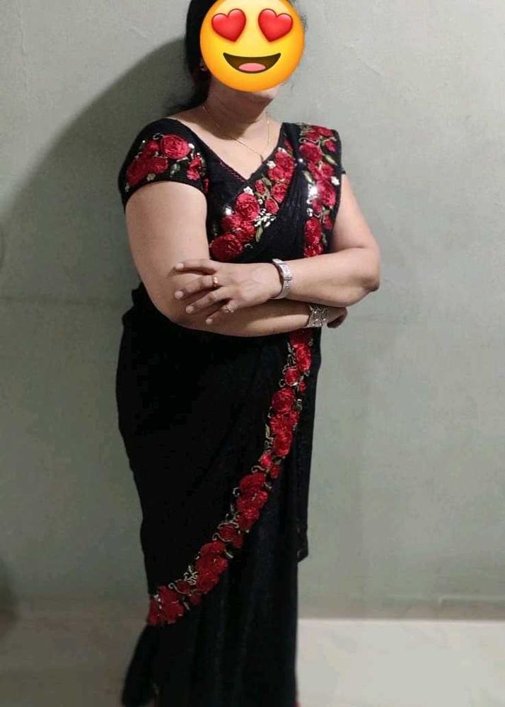 Elegant Black Saree with Red Floral Embroidery