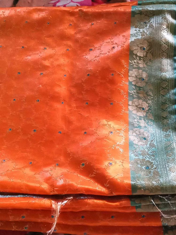 Vibrant Orange Saree with Blue &amp; Silver Border