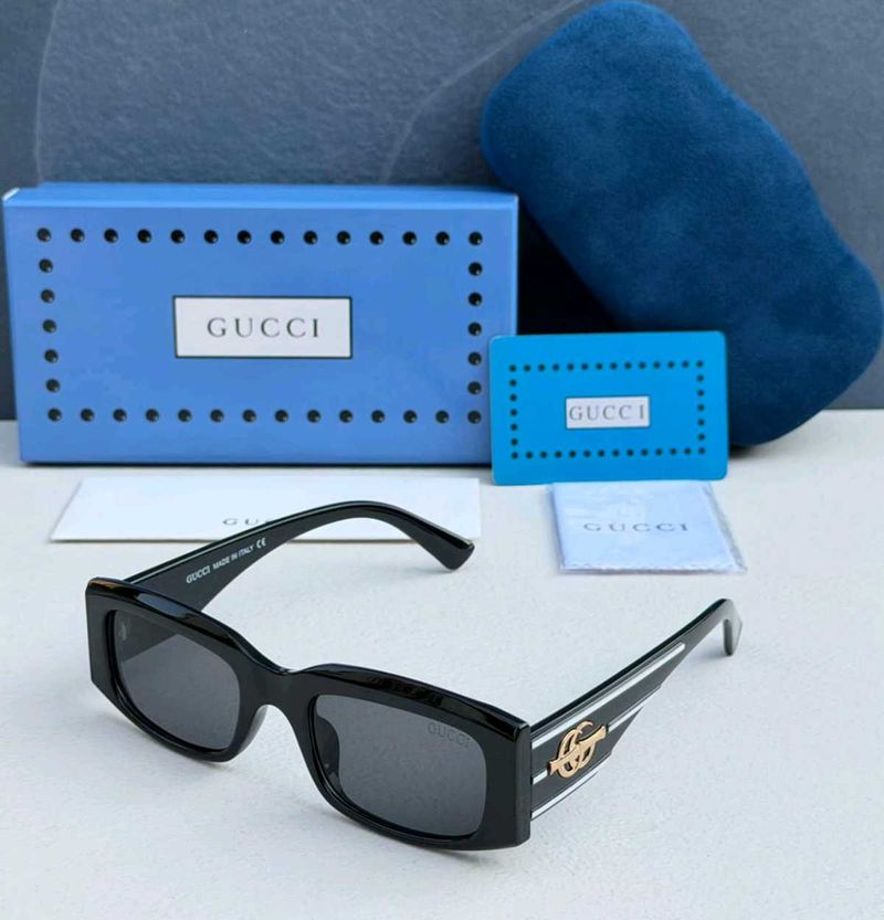Gucci Sunglasses Black with Gold Detail