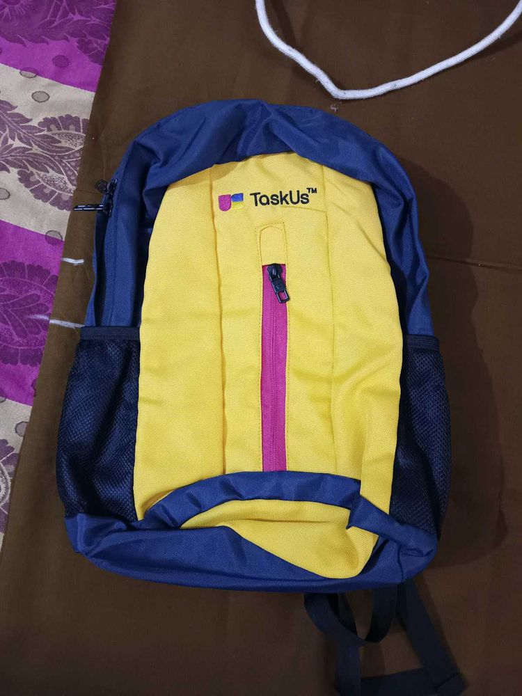 TaskUs Yellow &amp; Blue Backpack