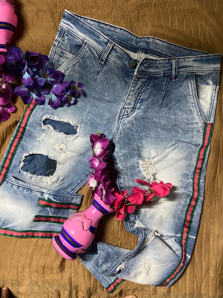 Ripped Jeans with Striped Detail