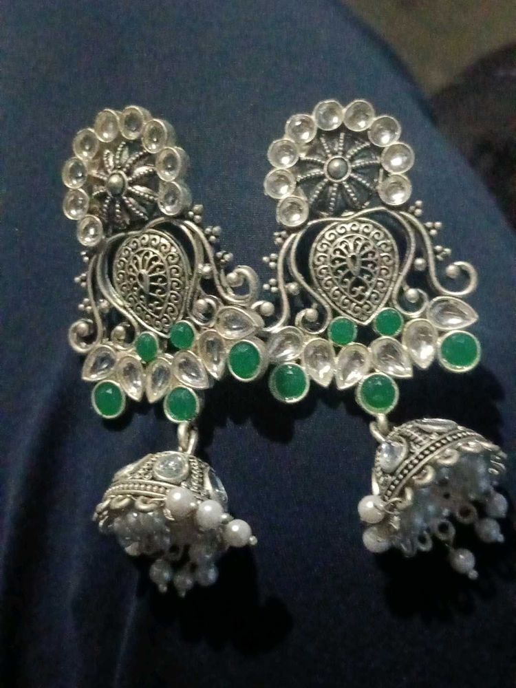 Elegant Jhumka Earrings with Green Stones