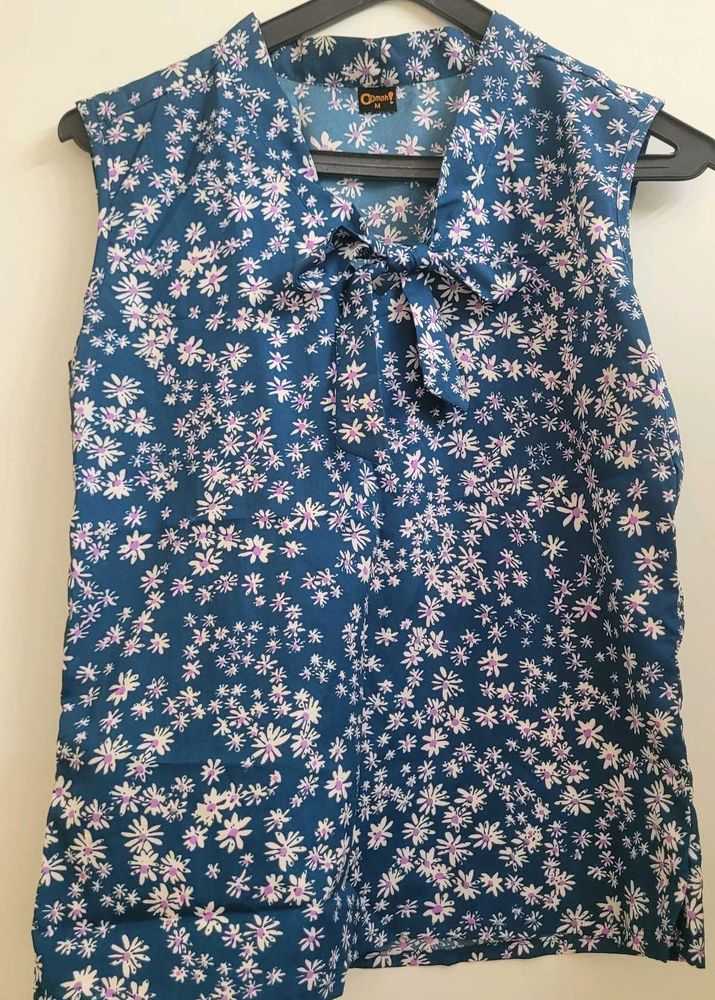 Blue Floral Sleeveless Top with Bow