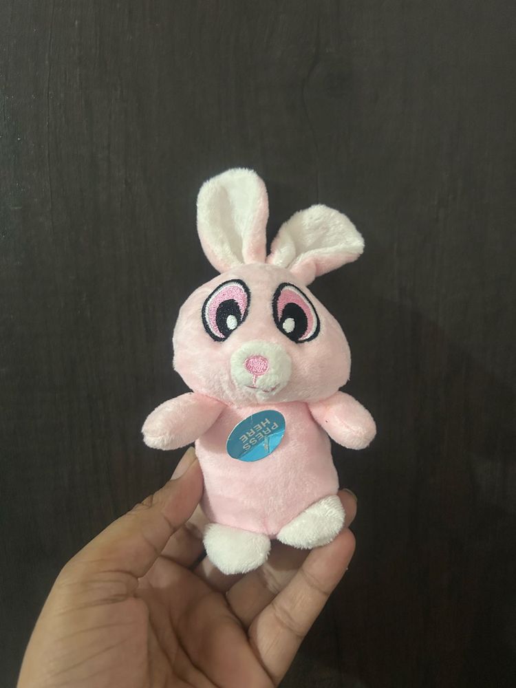 pink plush bunny stuffed toy with white inner