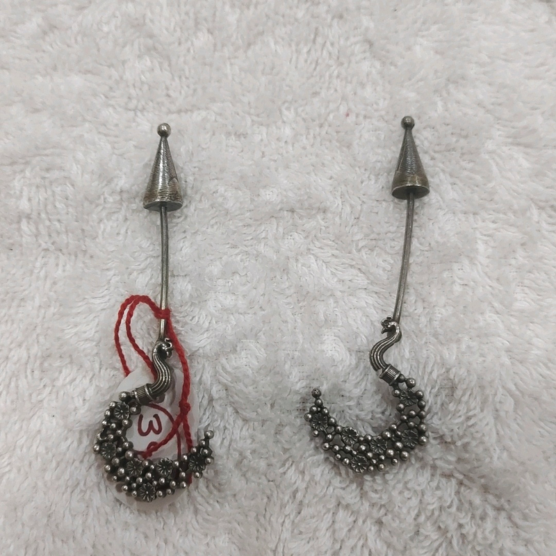 unique  silver look alike earing