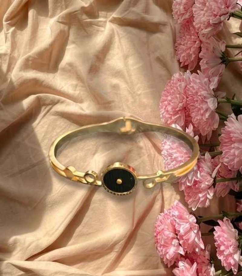 Elegant Gold Tone Black Stone Bangle