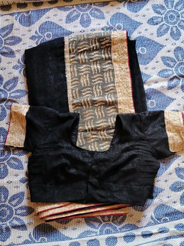 Black Georgette Saree with Gold Embellishments