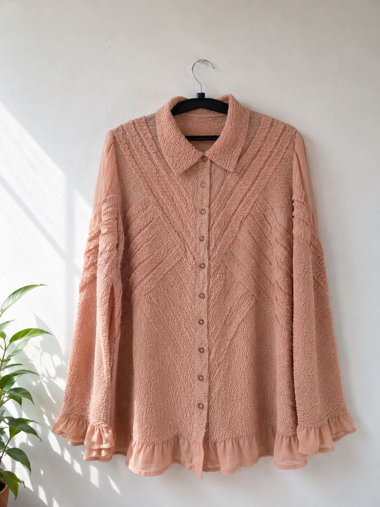 Chic Peach Textured Blouse with Ruffle Hem