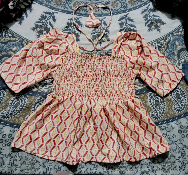 Smocked Puff Sleeve Blouse with Tassel Tie
