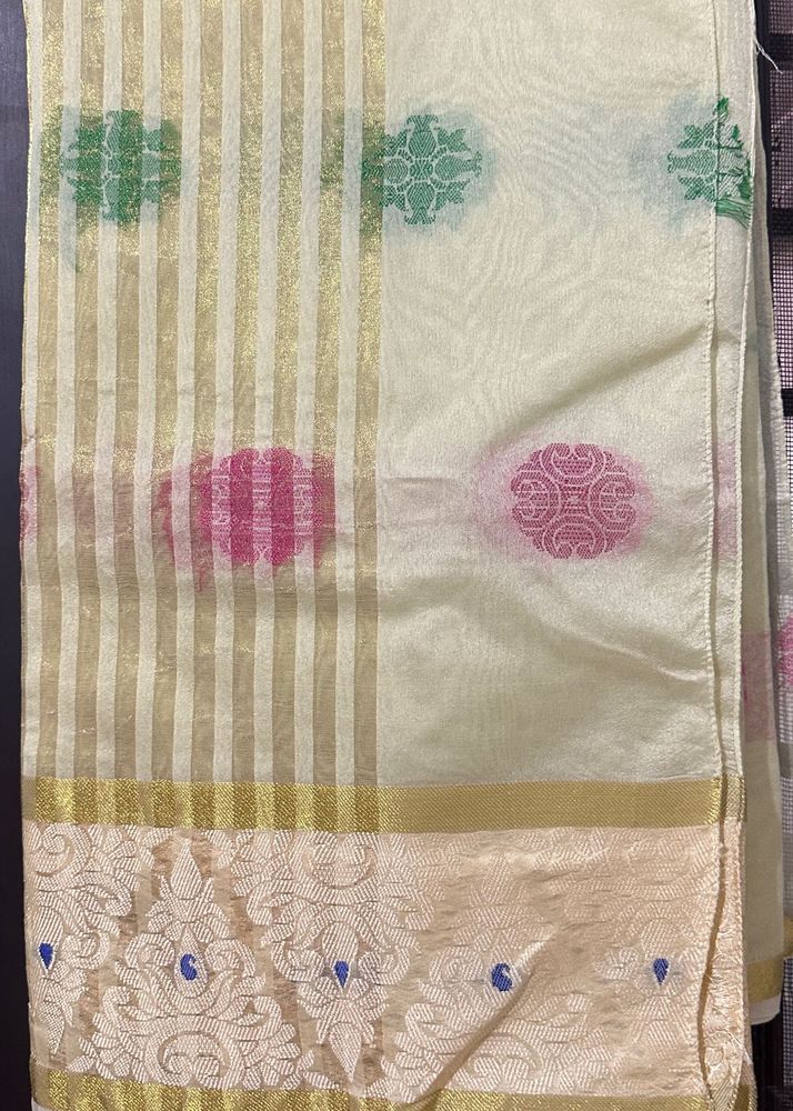 Elegant Cream Saree with Gold &amp; Pink Motifs