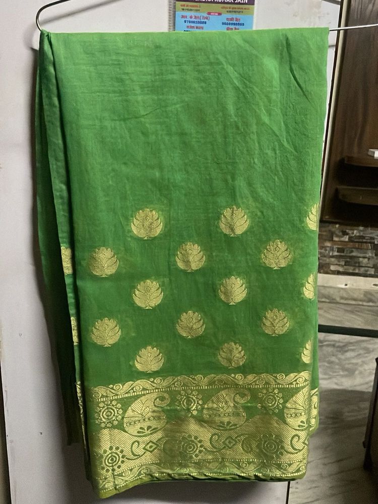 Vibrant Green Saree with Gold Border