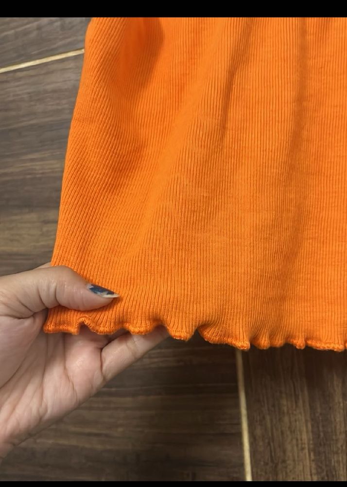 Vibrant Orange Ribbed Lettuce Hem Top