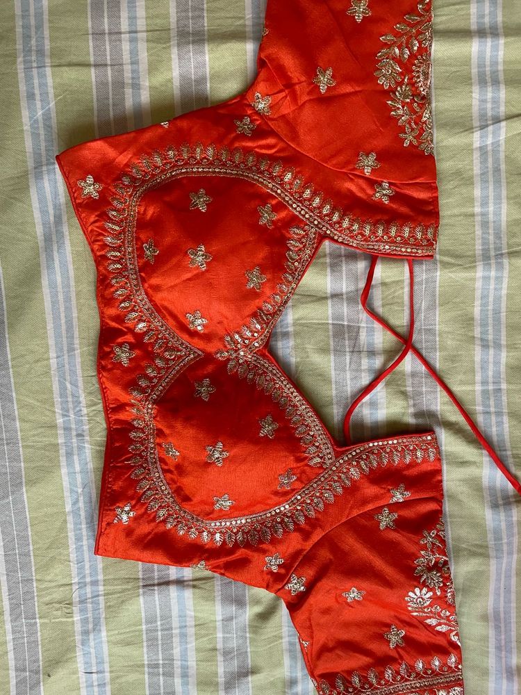 Stunning Orange Embroidered Blouse