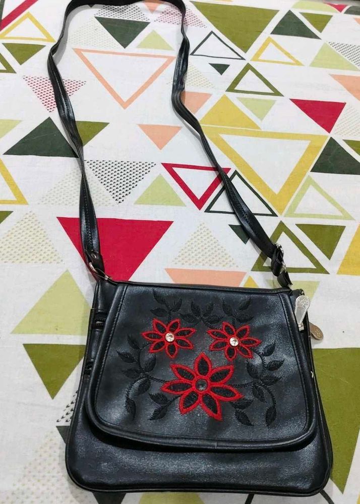 Chic Black Crossbody Bag with Floral Embroidery