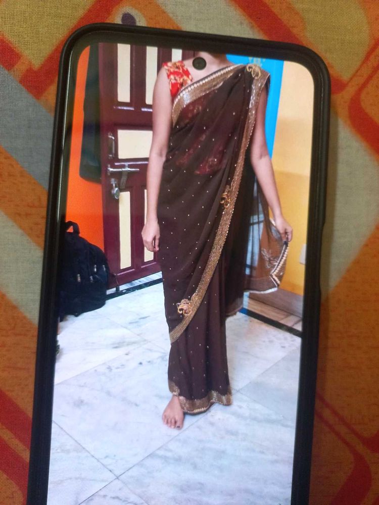 Elegant Brown Saree with Gold Border