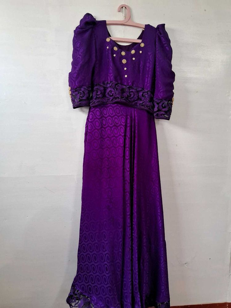 Elegant Purple Brocade Gown with Gold Accents
